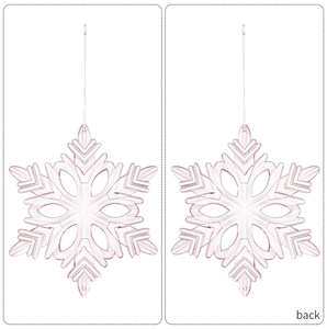 Macro view of pink hexagonal acrylic snowflake pendant showing front and back detail