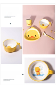 Detail view of yellow duck baby tableware set with divided plate and heat resistant bowl