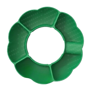 Close-up of green flower-shaped 8-compartment silicone snack ring for 40oz tumblers