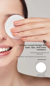 Macro shot of cotton pad with curved edge design for precise eye and nose cleaning