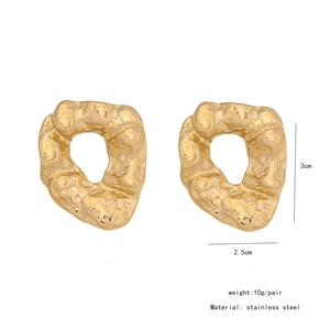 Detailed view of gold irregular textured stainless steel earrings with size measurements