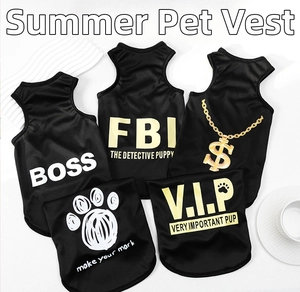 Detail of five black polyester pet vests with BOSS, FBI and V.I.P printed graphics