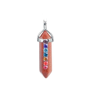 Detail of hexagonal reddish-brown crystal pendant with seven colorful rhinestones
