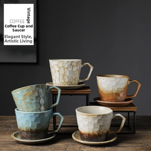 Detailed set of vintage stoneware coffee cups and saucers in various gradient glazes