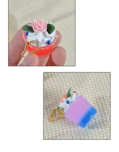 Mini faux ice cream cup keychain featuring gradient colors and a pink rose detail