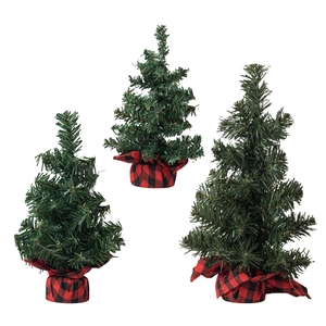 Set of three mini green Christmas trees with red plaid bases for tabletop decor