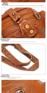 Close-up of textured leather surface with metallic hardware and adjustable strap detail
