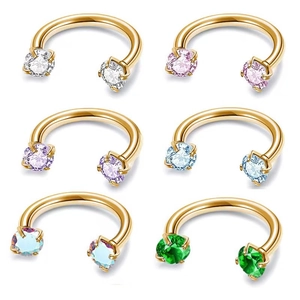 Detailed set of six golden horseshoe rings with colorful zircon stone inlay and metal finish