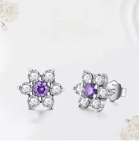 Macro shot of S925 sterling silver stamp on floral stud earrings with purple center stone