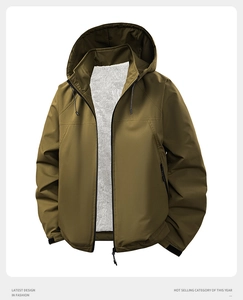 Detail of army green jacket with thick white fleece lining and drawstring hood