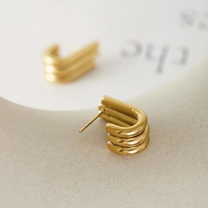 Three-layer U-shaped gold hoop earrings in minimalist polished 18K gold plated steel