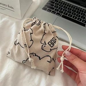 Corduroy drawstring storage bag with cute bear print for cosmetics and small accessories