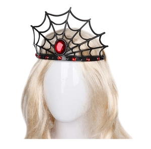 Macro detail of Halloween spider web crown with black metal frame and red crystal jewels