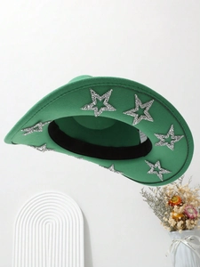 Detail of green cowboy hat with sparkling silver star sequins and wool felt texture