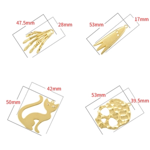 Golden Halloween pendants including skull hand, trident, cat and skull charms with size data