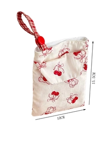 Detail view of mini cotton pouch with red cherry prints and 15.5x10cm size marking