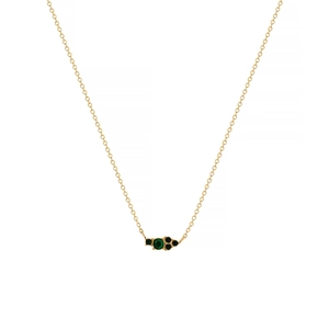 Detail of 18k gold plated necklace with green gemstone and black accent stones