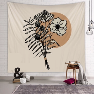 Bohemian floral line art tapestry with sun motif on white brick wall for home decor