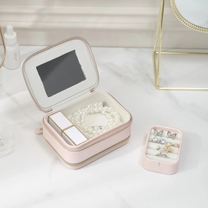 Pink leather double-layer travel jewelry box with mirror and accessory storage compartments