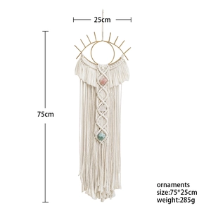 Handmade boho cotton macrame wall hanging with golden evil eye and natural stones