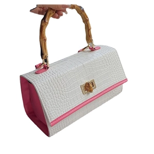 White crocodile pattern handbag with bamboo handles and pink trim for women