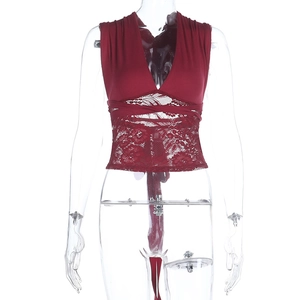 Detailed view of burgundy lace patchwork camisole with deep V-neck and lace-up front