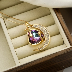 Gold plated moon and heart pendant necklace with colorful zircon stones in a jewelry box