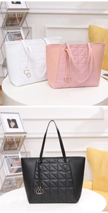 Detailed close-up of quilted tote bags in white, pink, and black colors with gold rings