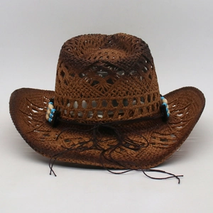 Detail of vintage straw cowboy hat featuring hollow weave and beaded decorative band