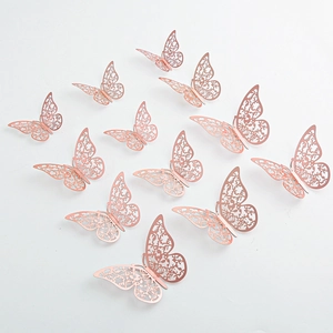 Set of 12 rose gold 3D hollow butterfly wall stickers with metallic finish on white back