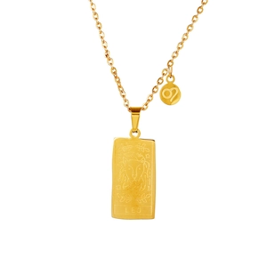 Detailed macro view of the gold Leo zodiac pendant necklace with tarot pattern