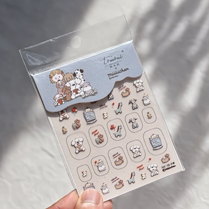 Detail of MIC 01 embossed nail art stickers featuring cute cartoon dogs and animals