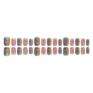 Short square press-on nails set with blue-yellow gradient and sparkling fireworks patterns