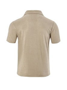 Close-up of khaki corduroy fabric texture on the back of a men's short-sleeved polo shirt