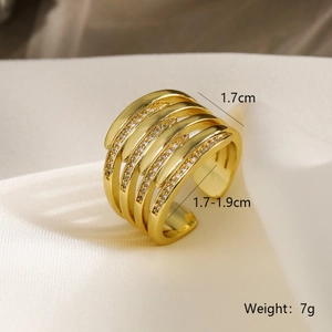 Macro detail of gold-plated open ring showing 1.7cm width and zircon-encrusted hollow layers