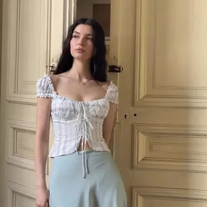 French vintage floral crop top with puff sleeves and tie-front detail for women