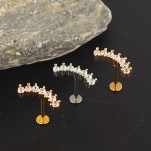 Three-piece zircon curved labret set in gold, silver, and rose gold for body piercing
