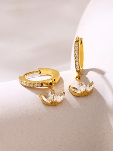 Macro shot of 18K gold plated clover earrings with micro-pave marquise zirconia