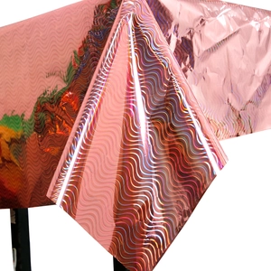 Pink holographic foil tablecloth with wavy patterns for festive party decorations