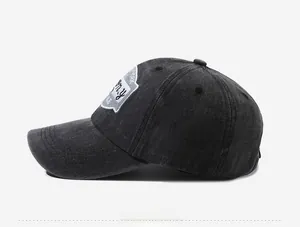 Side view of washed vintage cotton baseball cap featuring YORK embroidery and air vents
