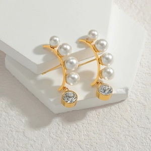 French vintage pearl drop earrings with gold C-shape hooks and clear zircon accents