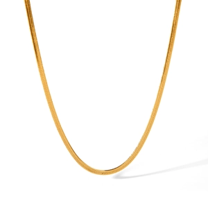 Detailed view of a sleek golden snake chain necklace with a smooth metallic finish