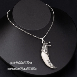 Detail of wolf head necklace with tooth pendant showing 70cm perimeter and 22g weight