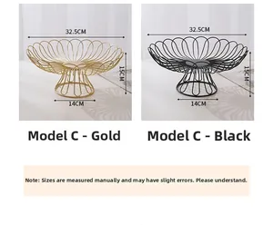 Detail view of gold and black petal-shaped iron fruit baskets with size dimensions