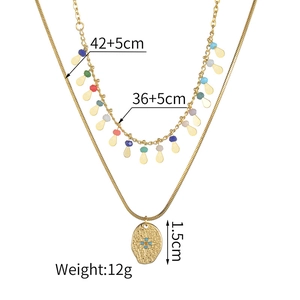 Detailed view of layered 304 stainless steel gold necklace with starburst pendant and measurements