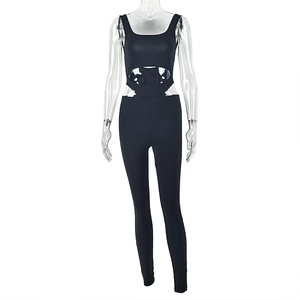Close-up of black slim fit jumpsuit featuring sexy symmetrical side waist cut-out details