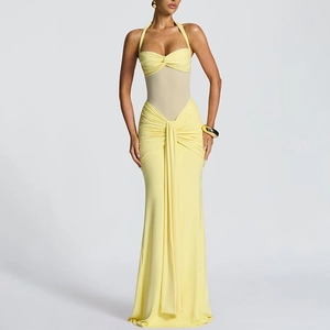 Elegant yellow ruched halter neck maxi dress with contrast mesh waist panel and backless design
