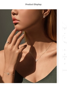 Detailed view of S925 sterling silver irregular heart jewelry set worn by a model