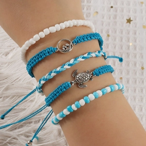 Handmade woven turtle bead bracelet set for women featuring wave and sea turtle charms