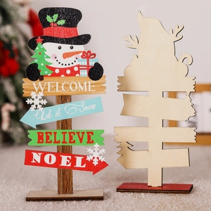 Christmas wooden desktop sign featuring a snowman and festive signs like Let it Snow